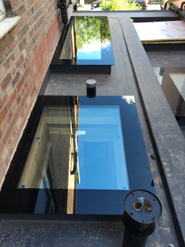 Multiple flat roof skylights on extension in Windsor